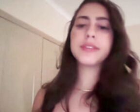 Sieena sucking her finger