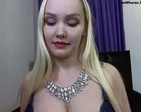 I wish I knew who is this busty blonde