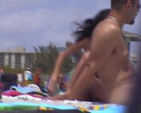 Naked woman on the beach