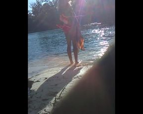 Blonde Sheds her Top in Public on River Beach as Butterfy Shed Cocoons